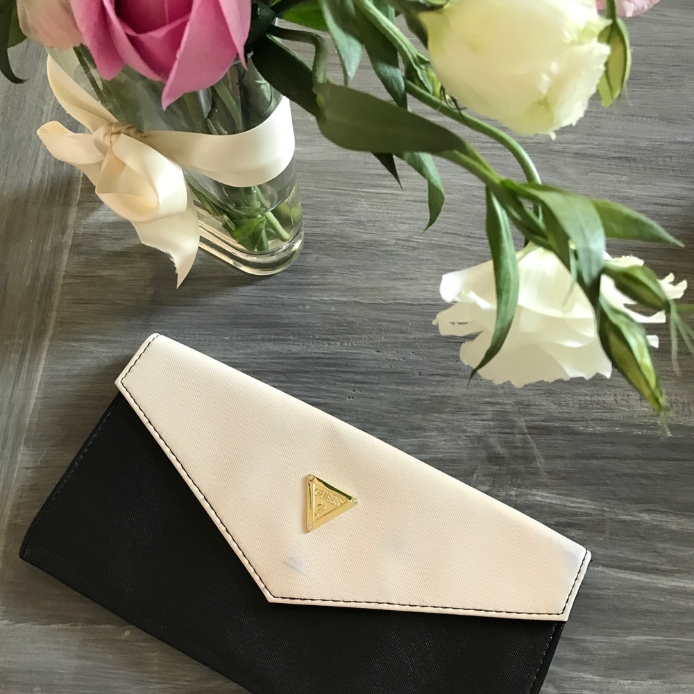 NWOT Guess clutch slight discoloration